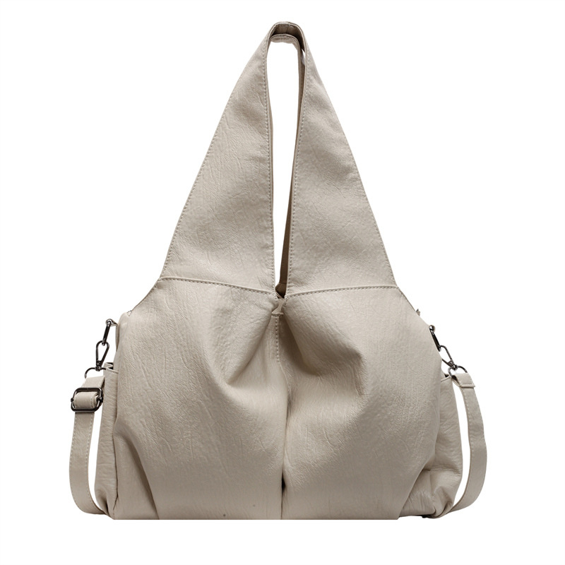 PU válltáska városi egyszerű stílusban, horizontálisan négyzetes forma, cipzáras nyitás és belső cipzáras zseb.