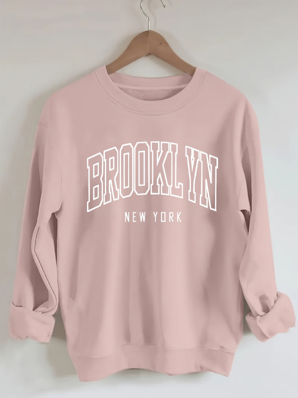 Brooklyn betűk pulóver, laza lányos stílus, poliészter 95%+, betűs minta, kerek nyakú, rövid ujjú