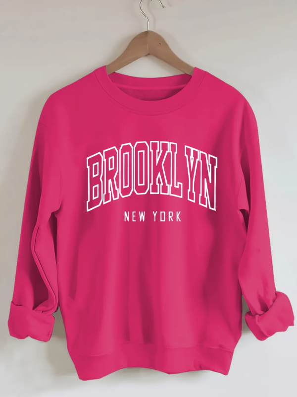 Brooklyn betűk pulóver, laza lányos stílus, poliészter 95%+, betűs minta, kerek nyakú, rövid ujjú