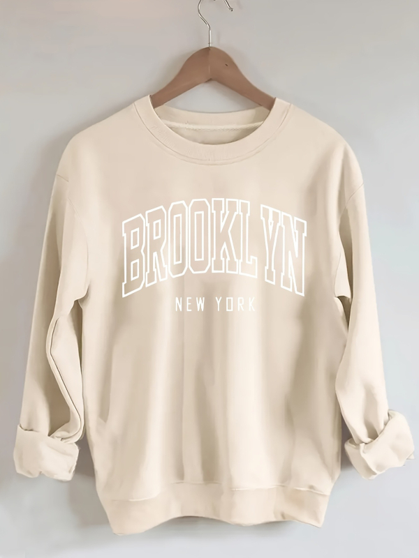 Brooklyn betűk pulóver, laza lányos stílus, poliészter 95%+, betűs minta, kerek nyakú, rövid ujjú