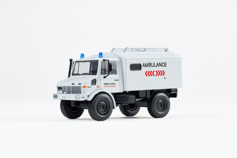 Mcdi Unimog U1300L офроуд спасителен RV модел автомобил, сплавно тяло, мащаб 1:64, ръчно управление