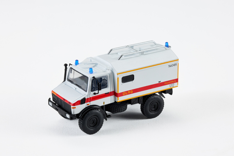 Mcdi Unimog U1300L офроуд спасителен RV модел автомобил, сплавно тяло, мащаб 1:64, ръчно управление