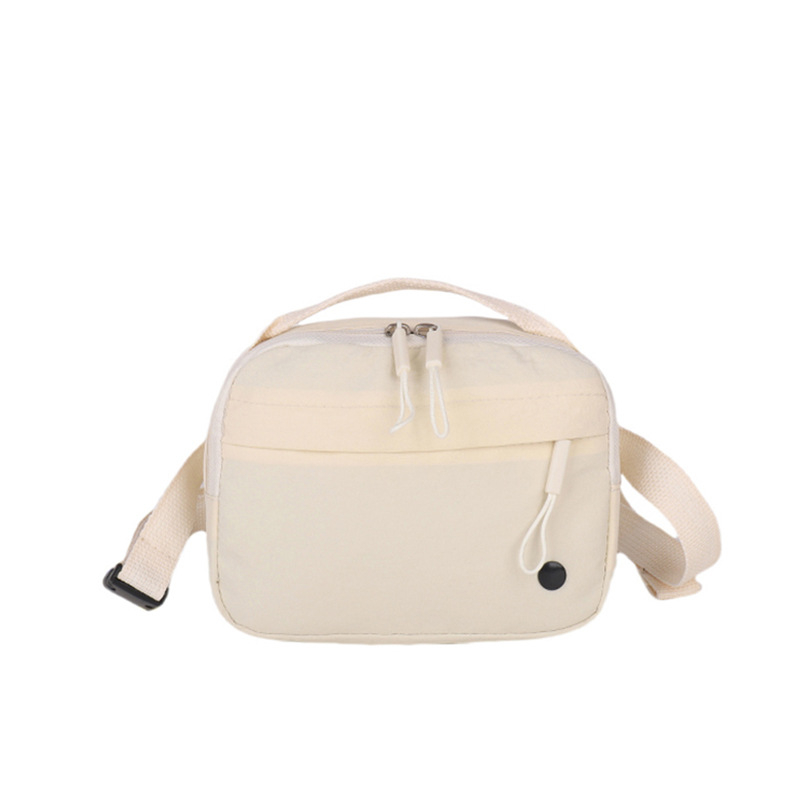 Női nylonos crossbody táska, vízszintes négyzet alakú, belső zseb telefon és személyi igazolvány számára, cipzáras záródás, poliészter bélés, mindennapi használatra