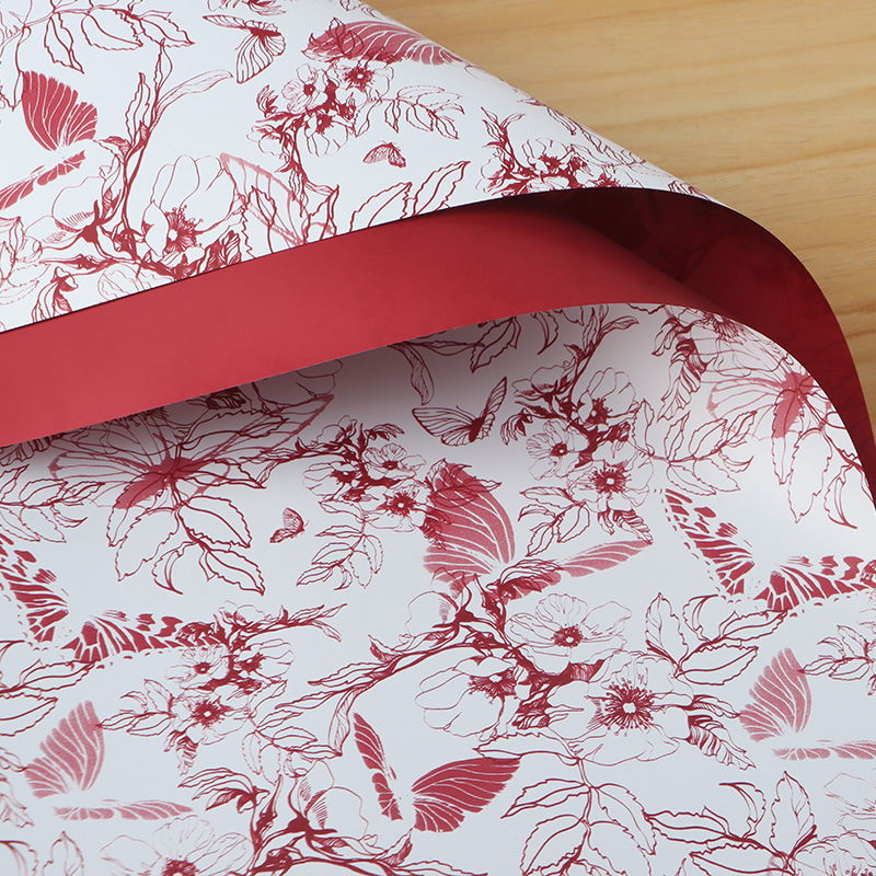 Gėlių įvyniojimo popierius, drugelių puokštės raštas, BOPP medžiaga, 20 lapų pakuotėje