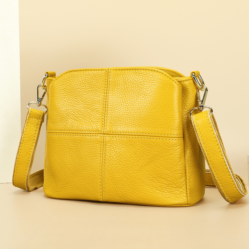 Női oldaltáska valódi bőrből, első réteg marhabőrből, bucket stílus, vízszintes négyzet alak, cipzáras zárás