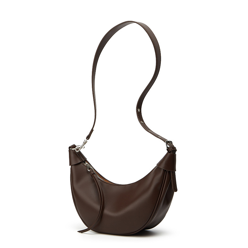 PU anyagú félhold alakú crossbody válltáska, cipzárral záródó, vízszintes négyzet alakú forma, belső cipzáras zseb és telefontartó zseb