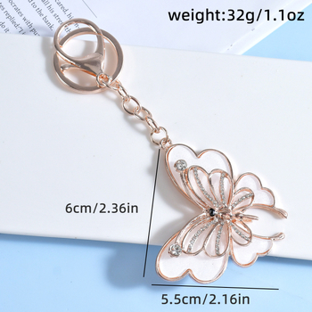 Κλειδοθήκη από κράμα ψευδαργύρου με διπλή πεταλούδα και διαμαντοειδείς λεπτομέρειες, για κλειδιά αυτοκινήτου και γούρι τσάντας