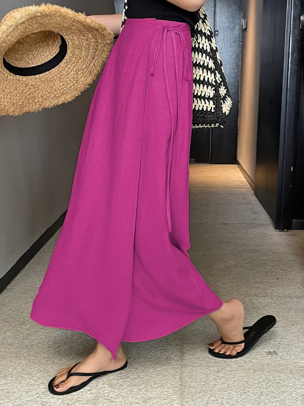 Ženska asimetrična suknja, srednja duljina, poliestersko-elastan materijal, elegantan svakodnevni stil, ljeto 2025 (90-95% poliestera; <30% elastan)