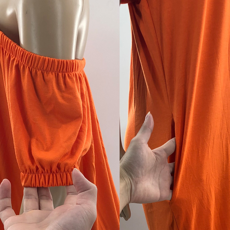 Egyszínű overál buborékos ujakkal, lazán szabott derékkal, egyenes szárú nadrág, poliészter-spandex keverék