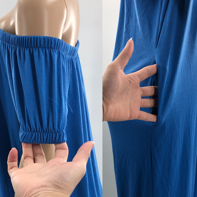 Egyszínű overál buborékos ujakkal, lazán szabott derékkal, egyenes szárú nadrág, poliészter-spandex keverék