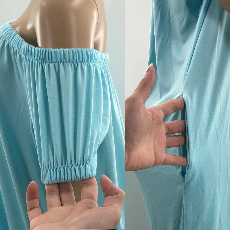 Egyszínű overál buborékos ujakkal, lazán szabott derékkal, egyenes szárú nadrág, poliészter-spandex keverék