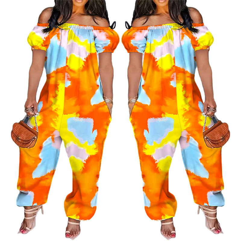 Egyszínű overál buborékos ujakkal, lazán szabott derékkal, egyenes szárú nadrág, poliészter-spandex keverék