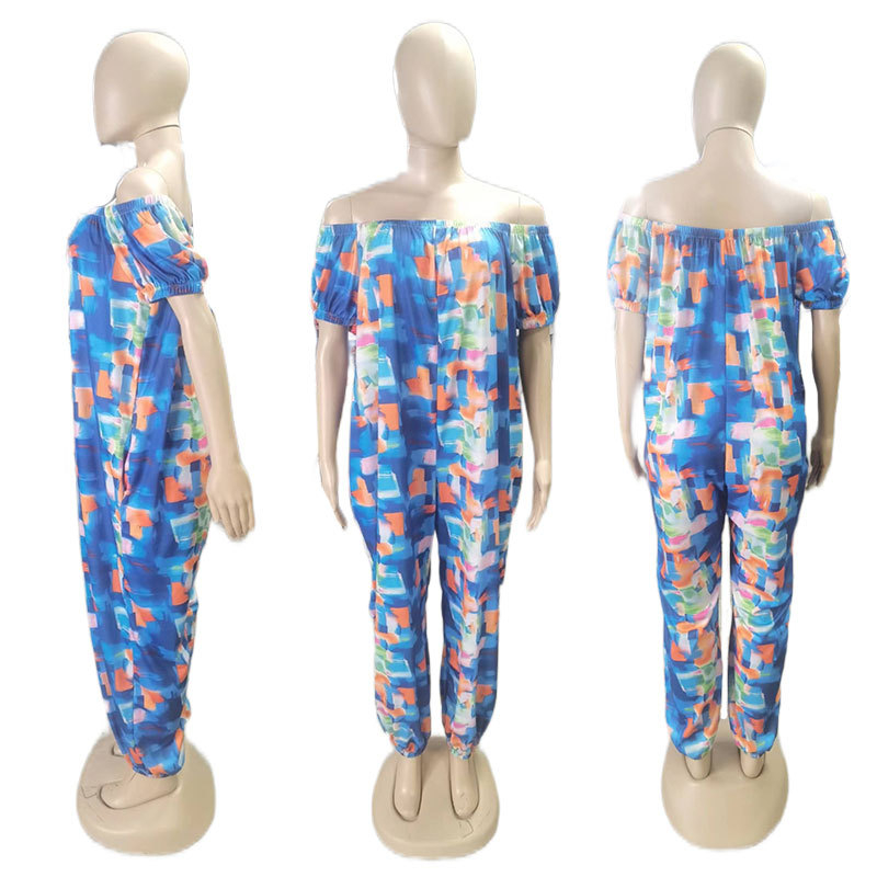 Egyszínű overál buborékos ujakkal, lazán szabott derékkal, egyenes szárú nadrág, poliészter-spandex keverék