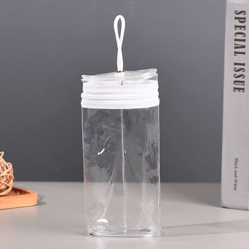 Skaidrus PVC pakavimo maišelis su apvalia cilindrine forma ir užtrauktuku, skirtas žymekliams ir pieštukams