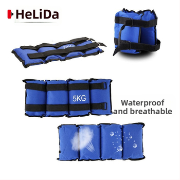 Helida leginsės su smėlio svoriais treniruotėms, reguliuojami čiurnos ir riešo svoriai