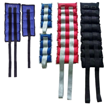 Helida leginsės su smėlio svoriais treniruotėms, reguliuojami čiurnos ir riešo svoriai