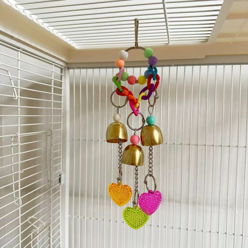 Papūgos žaislas su Paryžiaus stiliaus dizainu, romantiška širdies formos varpelis, kramymo žaislas (Ky2498)