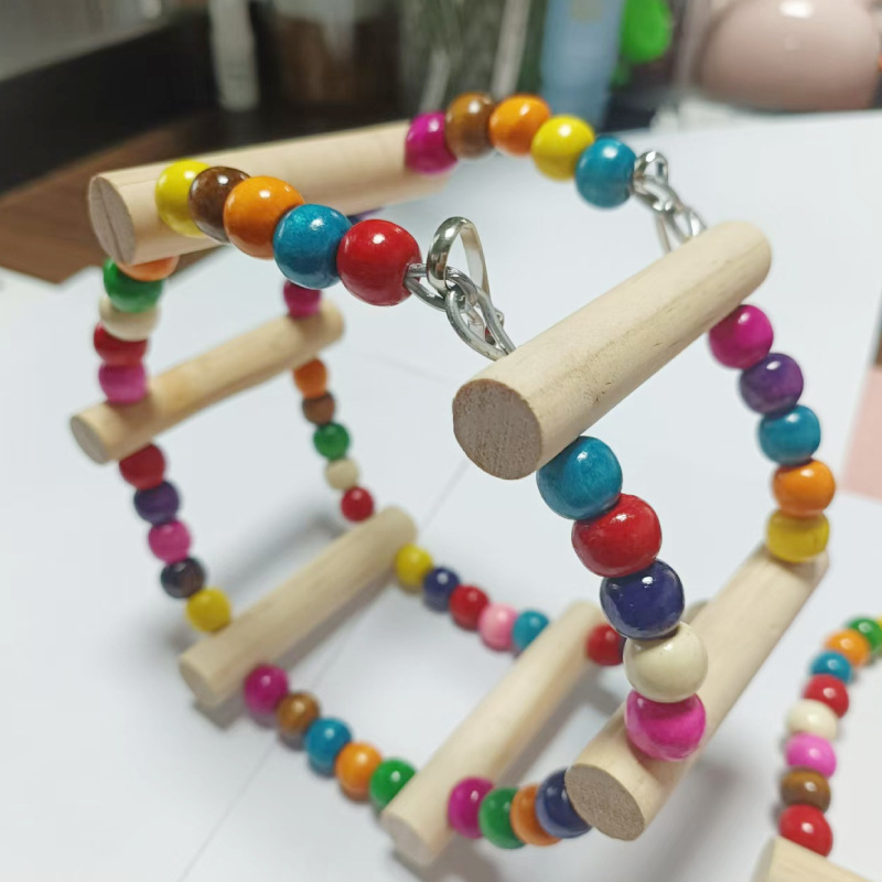 Madárfa hintázó és mászó létra játék — Anyag: Fa; Márka: Xingxingwen; Termékkód: Al63; Alkalmas: Madár