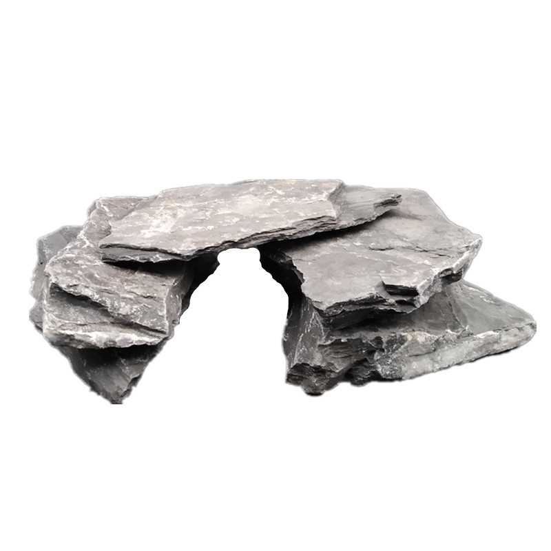 Bruņurupuču terārijs: sauļošanās platforma no akmens plāksnēm, dekoratīvie akmeņi