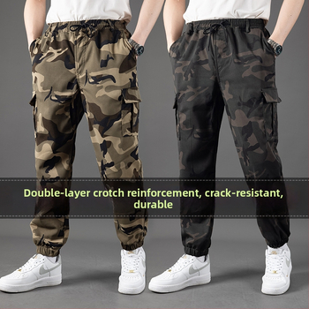 Παντελόνια εργασίας σε casual στυλ με καμουφλάζ, ελαστικό ύφασμα από μίγμα βαμβακιού-πολυεστέρα (90% πολυεστέρας), φαρδιά γραμμή, μικροελαστικότητα, πολλαπλές τσέπες, κλείσιμο με κορδόνι