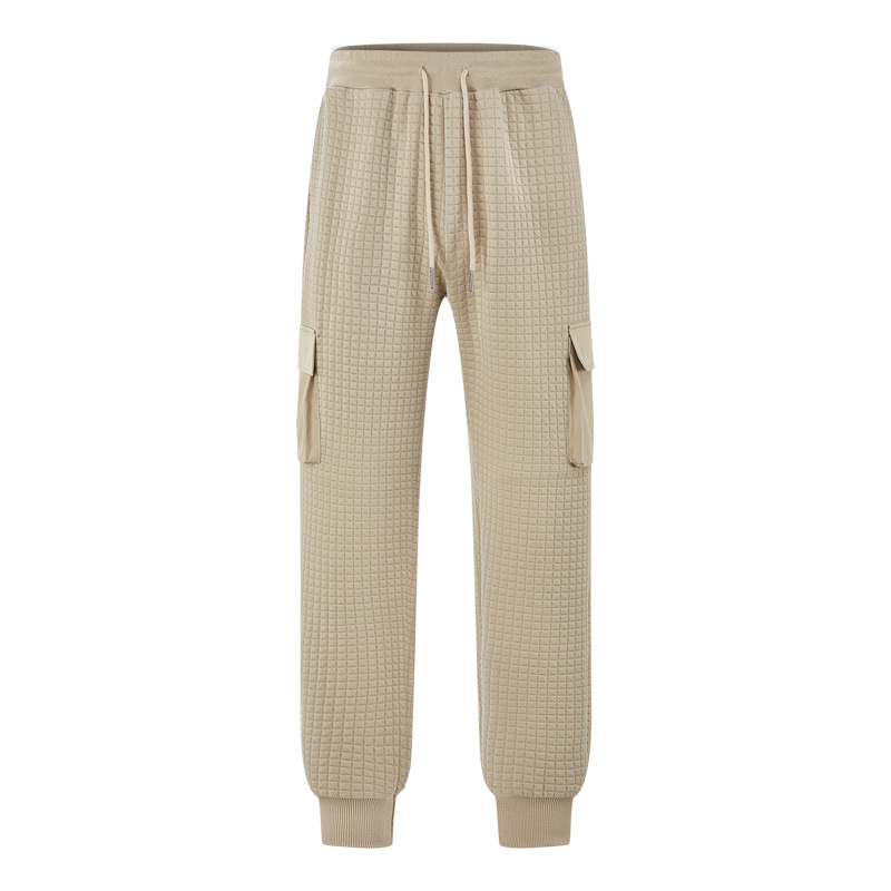 Férfiak szabadidő-munkanadrág, lazán szabott fazon, jacquard apró négyzetek mintázattal, rugalmas poliészter anyag, több zsebbel