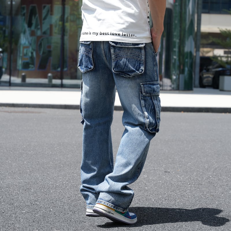 Férfiaknak készült farmernadrág, több zsebbel, széles szárú, középmagas derék, pamut denim, cipzáros záródás