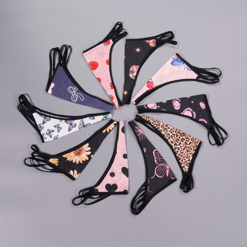 Γυναικείο στρινγκ εσωρουχ́ο, ύφασμα milk silk, 95–100% πολυεστέρας, επένδυση καβάλου: σπαντέξ, αναπνέει, αόρατο, αντιβακτηριακό, χαμηλή μέση, λεπτές τιράντες, τυχαίο μοτίο