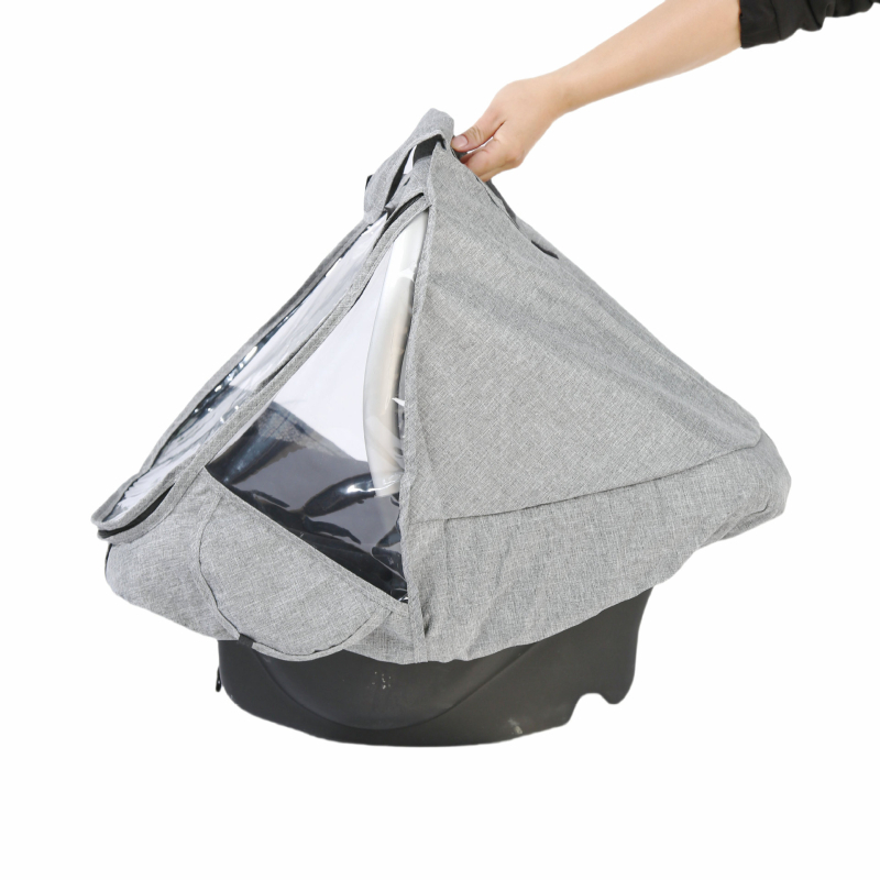 Copertă de ploaie pentru cărucior de bebeluți și scaun de purtare; material poliester; nu este importat.