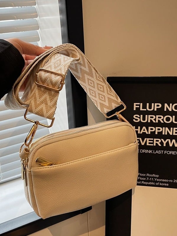 Női PU bőrtáska, vízszintes négyzet alakú, cipzáras záródás, poliészter bélés, belső cipzáras zseb és telefonzseb, puha anyag, egy vállpánttal, városi minimalista stílus