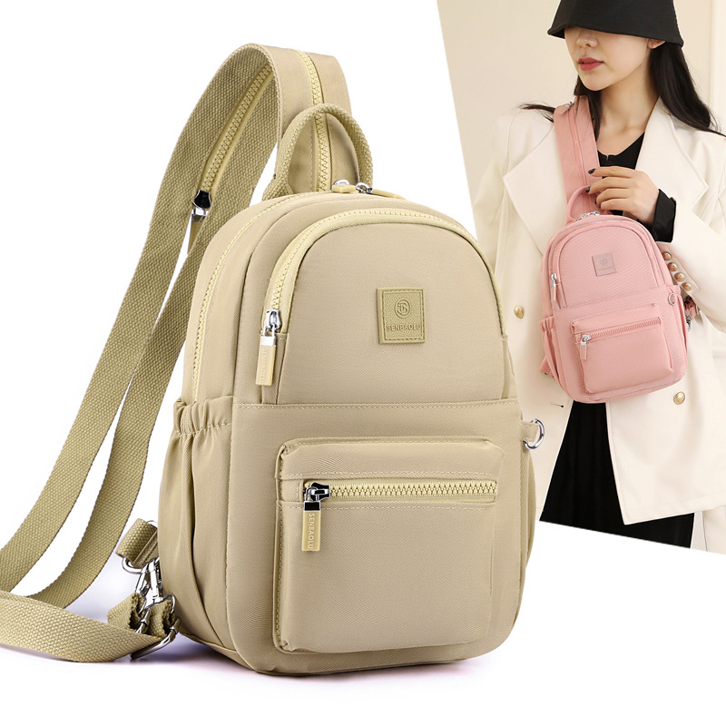 Γυναικεία νάιλον τσάντα πλάτης — αστικός μινιμαλισμός, άνοιγμα με φερμουάρ, εσωτερική θήκη με φερμουάρ, θήκες για κινητό και ταυτότητα, αναπνεύσιμη