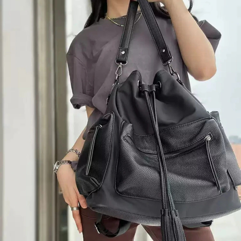 Női PU bőr hatású drawstring bucket táska, cilindrikus alakú, belső zseb a telefon számára és cipzáras zseb