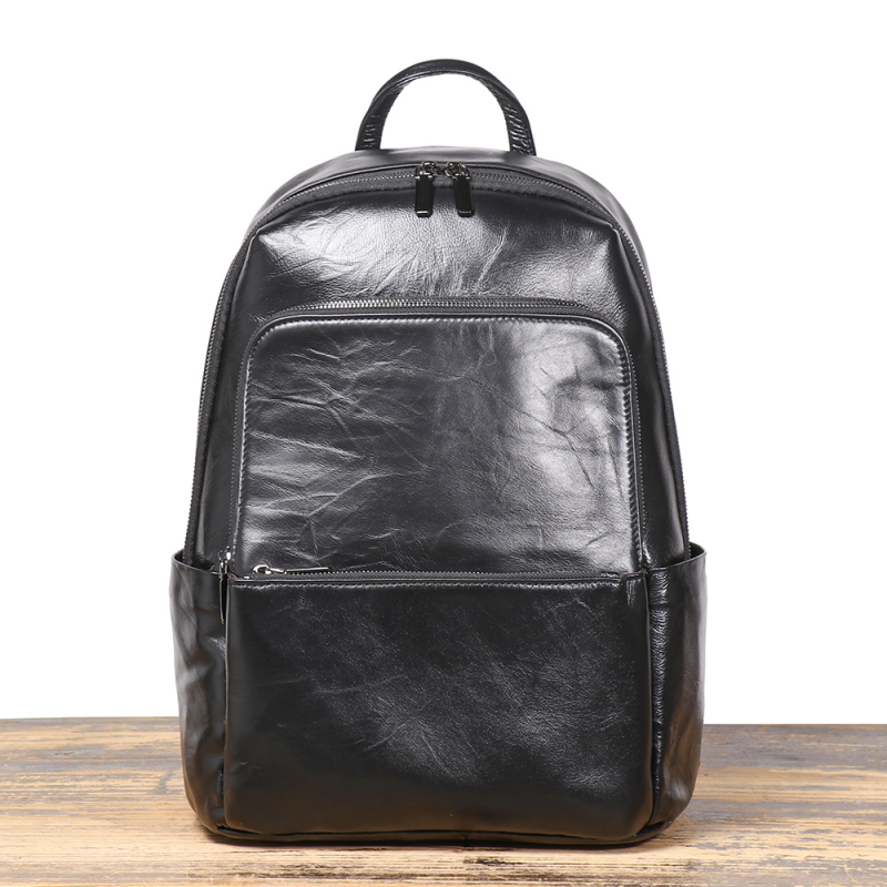 Valódi bőrből készült hátizsák, első réteg marhabor, bővíthető dizájn, kapacitás 20–35 L, üzleti utazások