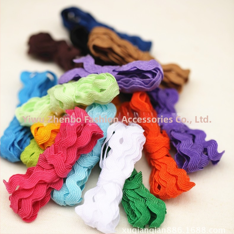 Poliesterio nėrinių juostelė drabužiams, S-formos vandens bangų raštas, įlenktas kraštas, Jumbo ženklas