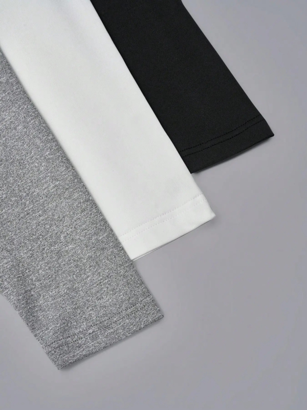 Set din trei piese din poliester cu piping, decolteu rotund, mâneci lungi, croială slim