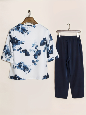 Γυναικείος δύο-κομμάτινος σετ με φλοράλ εκτύπωση: T‑μπλούζα και σορτς, άνοιξη-καλοκαίρι 2025, πολυεστέρας 95%+, μανίκια μισού μήκους, μήκος παντελονιού εννέα σημείων