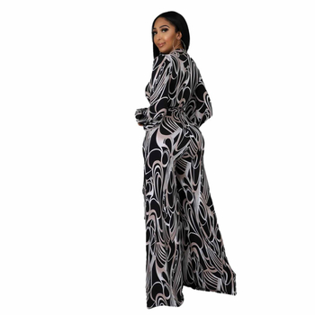 Печатен дамски гащеризон със свободен силует, полиестерова тъкан, талия средна, с широки крака, средна плътност