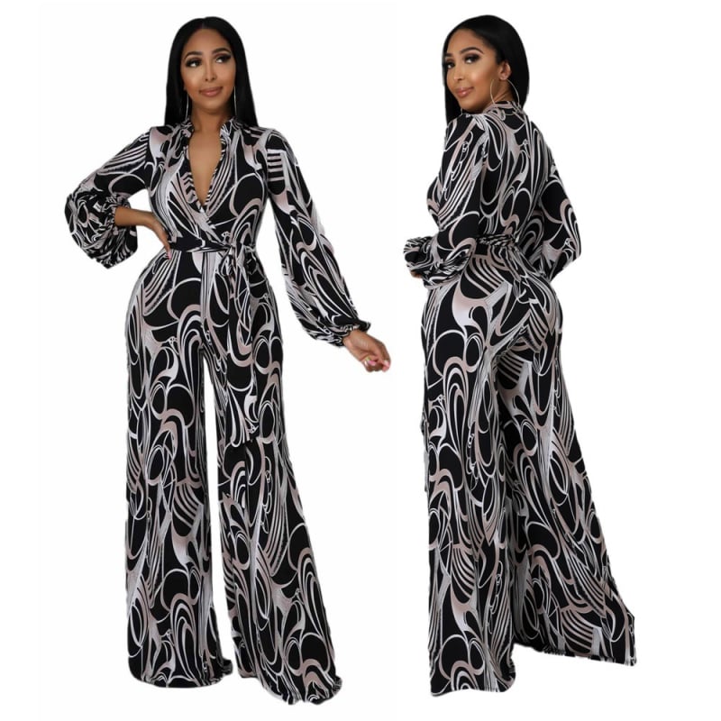 Печатен дамски гащеризон със свободен силует, полиестерова тъкан, талия средна, с широки крака, средна плътност