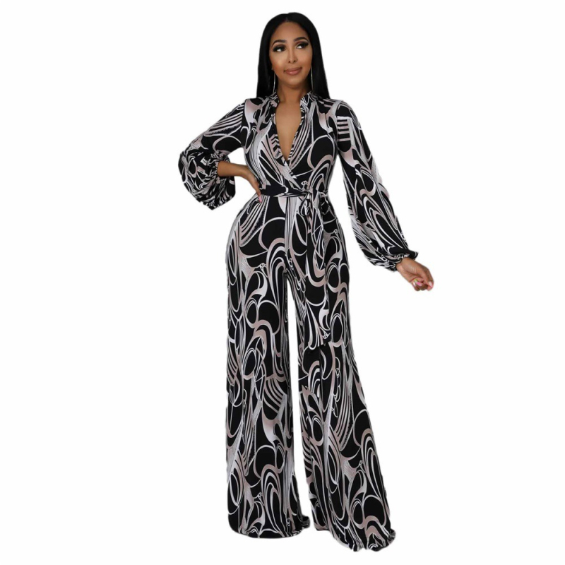 Печатен дамски гащеризон със свободен силует, полиестерова тъкан, талия средна, с широки крака, средна плътност