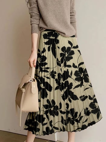 Ženska duga plisirana suknja s elastičnim pojasom, cvjetni uzorak, poliester–spandeks smjesa.