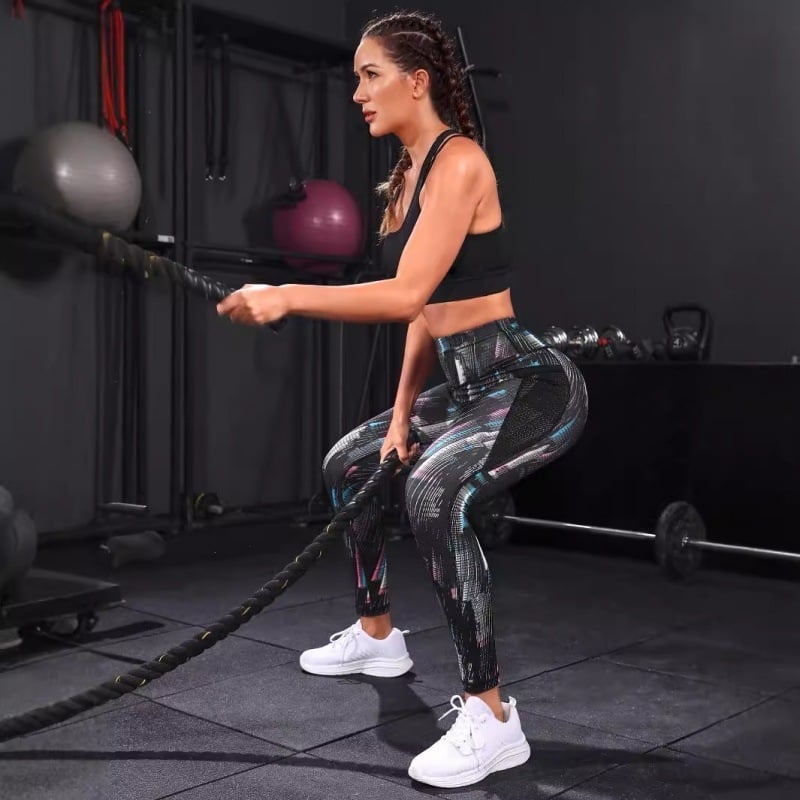 Jógapantalon magas derekú, graffiti mintás, poliészter-elasztán keverék, 9/10 hossz, fenékemelő hatás