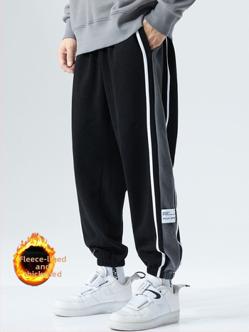 Sportnadrág fleece béléssel, lazán szabott, középmagas derékkal, poliészter 96% / spandex 4%