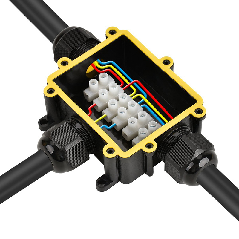 Triju vadības ūdensnecaurlaidīga savienojumu kastīte ārējai apgaismošanai – liesmu izturīga, plastmasas T formas kabelu kaste, 0,5–4,0 mm²