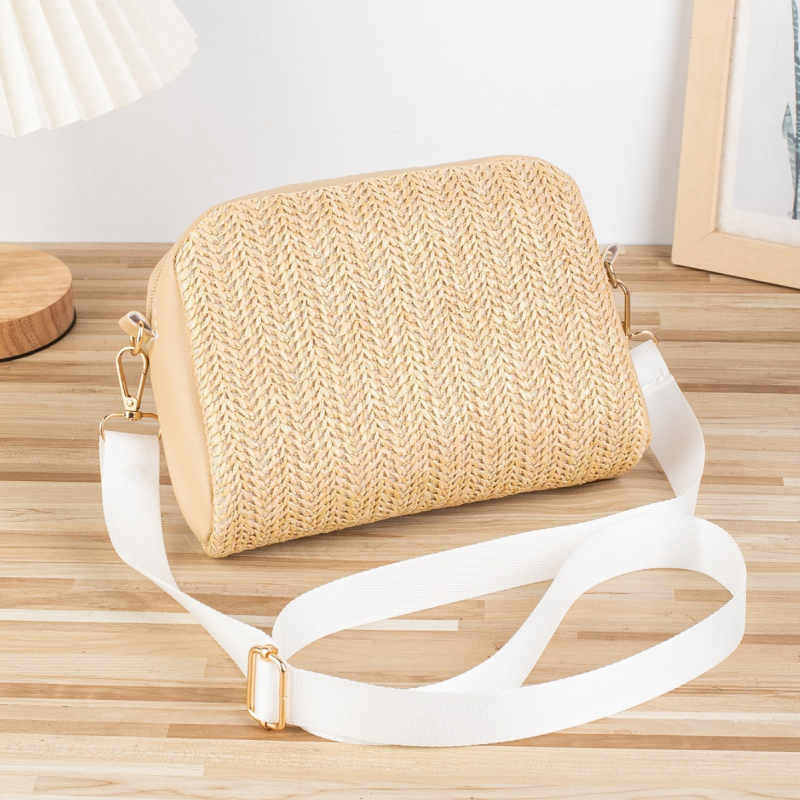 Szalmából készült kagyló alakú táska, városi minimalist stílus, cipzáras zárás, poliészter bélés, mobiltelefon zsebbel