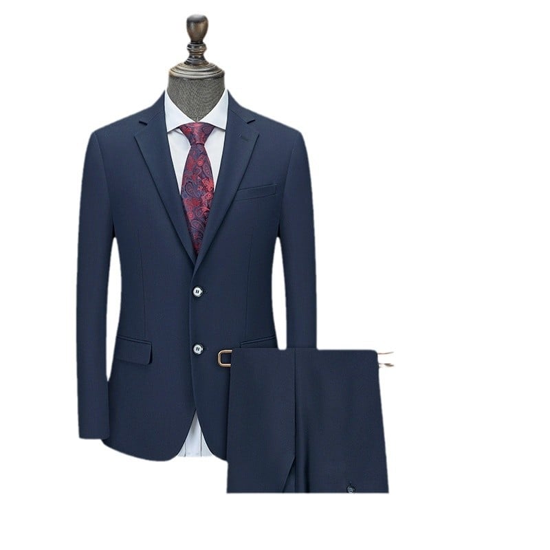 Muški poslovni kostim slim fit, plosati rever, zatvaranje na dva gumbа, srednji stražnji otvor, tkanina od viskoze u smjesi s kemijskim vlaknima