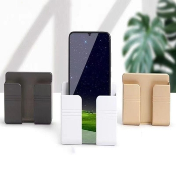 Fali szerelhető töltő- és tárolóalap telefonhoz és távirányítóhoz