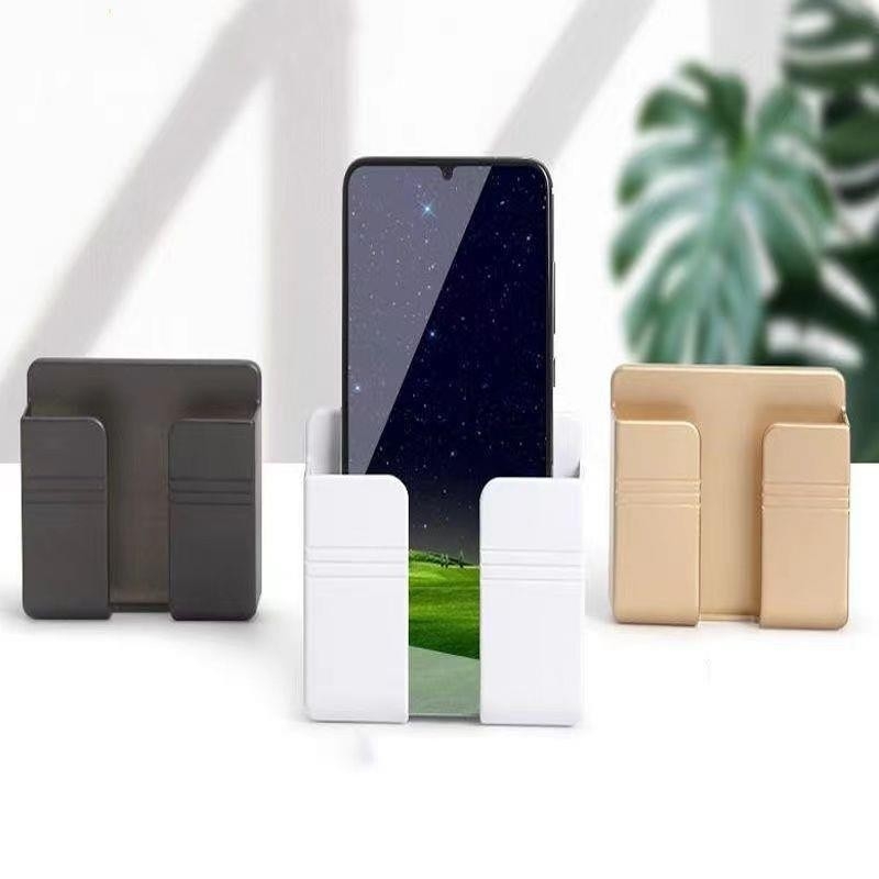 Fali szerelhető töltő- és tárolóalap telefonhoz és távirányítóhoz