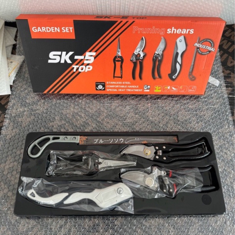 Brken öt részes kerti szerszámkészlet mangánacélból, metszőollóval és összecsukható fűrésszel, egy dobozban