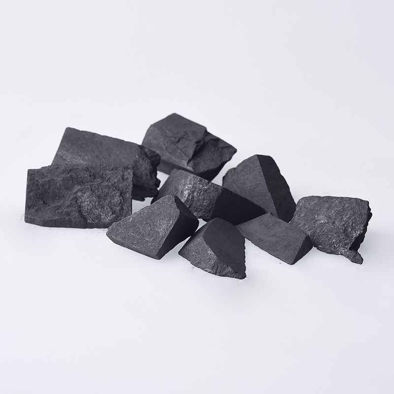 Shungito kristalų grubus akmuo – kartoninis įpakavimas; grynoji masė nuo 100 g; tinkamas įmonių dovanoms