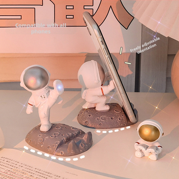 Силиконов държач за телефон с астронавт – карикатурен стил, за бюро и декорация