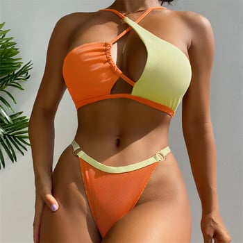 Dvodijelni bikini s vezanjem oko vrata, s umetnutim grudima, bez leđa (80% poliester, podstava poliester/spandeks 18%)